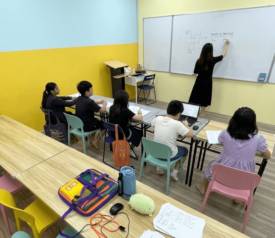 A tutor guiding a student through the PSLE with Pace program